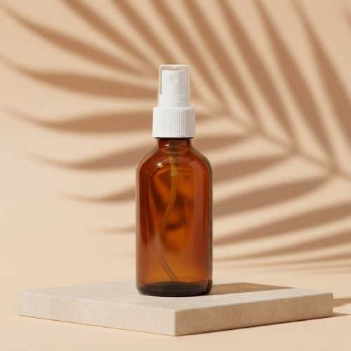 Amber Glass refillable Round Bottle with Mist Spray Pump