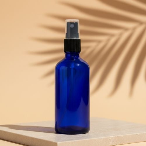 Blue Color Glass Refillable Round Bottle With Mist Spray Pump